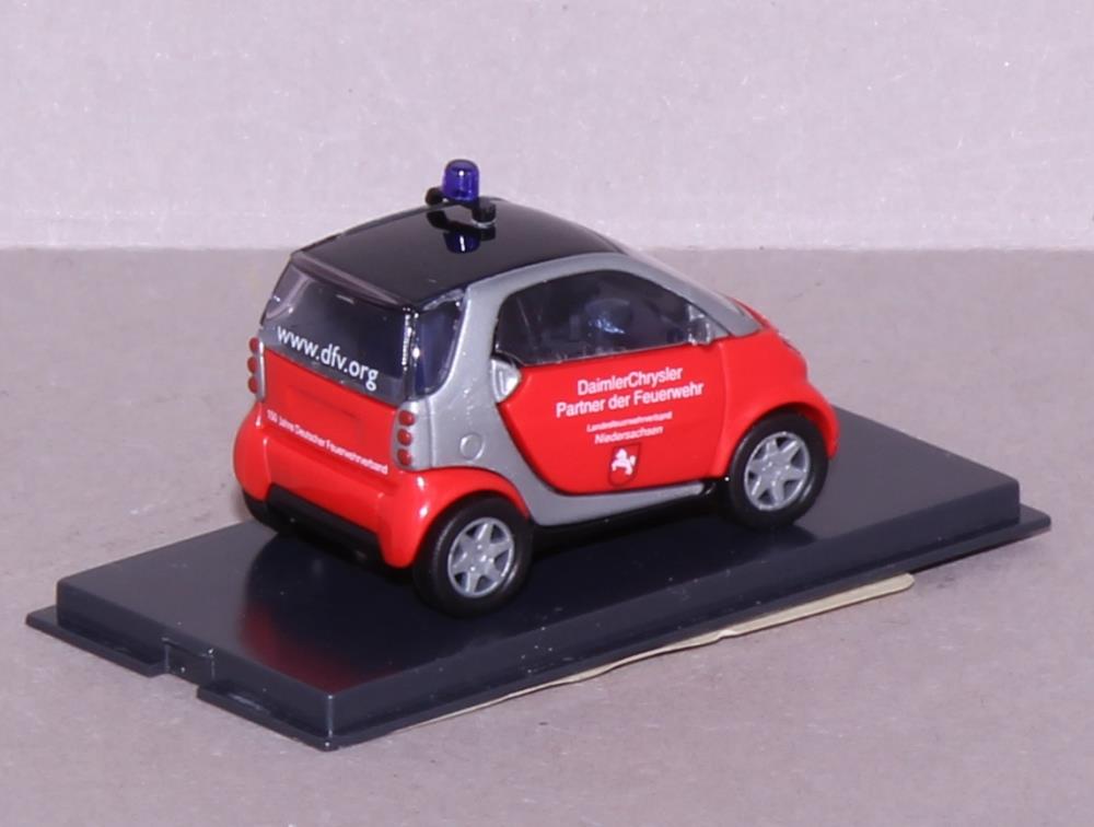 Busch 489309 Smart City Coupe Feuerwehr - 1:87 - Standmodell - Neu