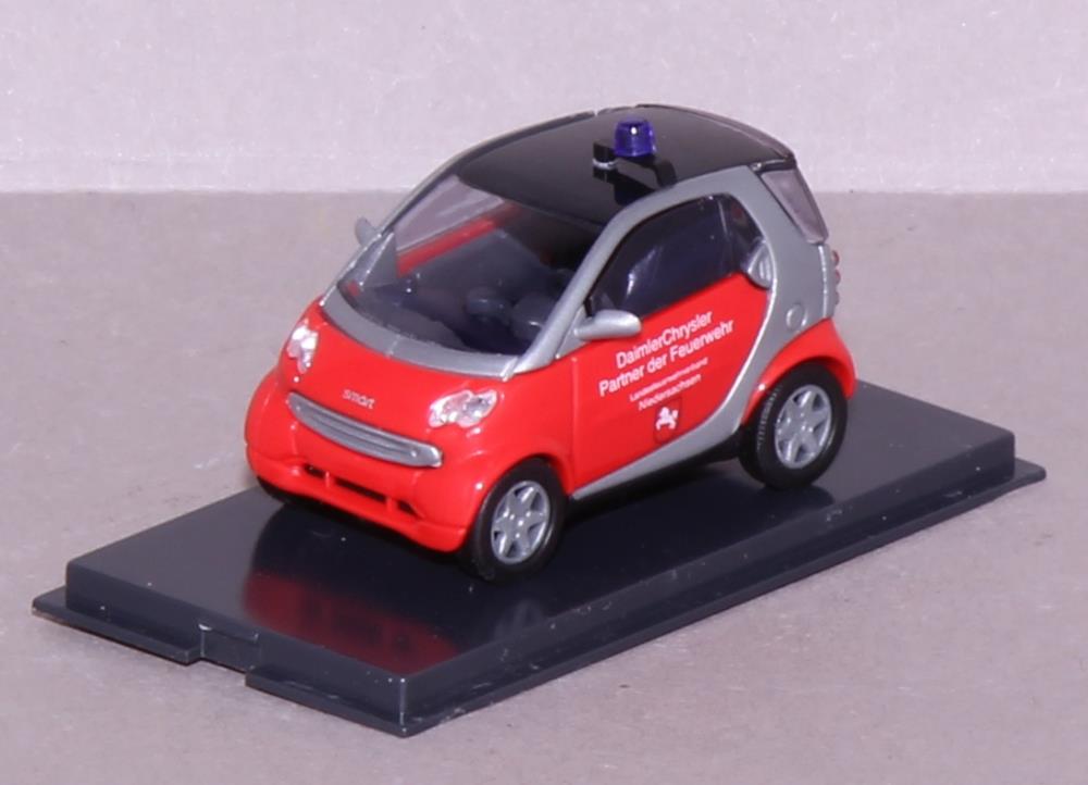 Busch 489309 Smart City Coupe Feuerwehr - 1:87 - Standmodell - Neu