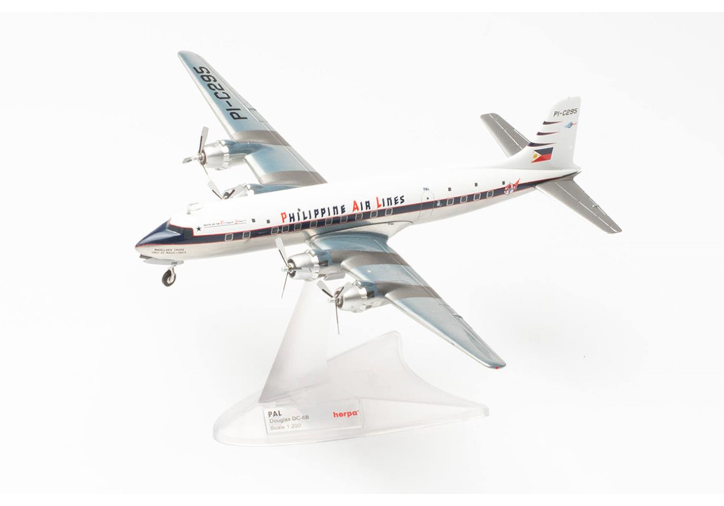Herpa 572545 Philippine Airlines DC-6B - PI-C295 "Magellan’s Cross" 1:200