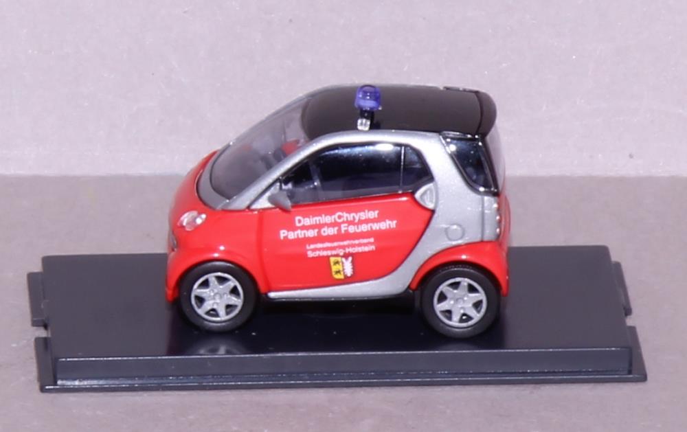 Busch 489315 Smart City Coupe Feuerwehr Schleswig-Holstein - 1:87