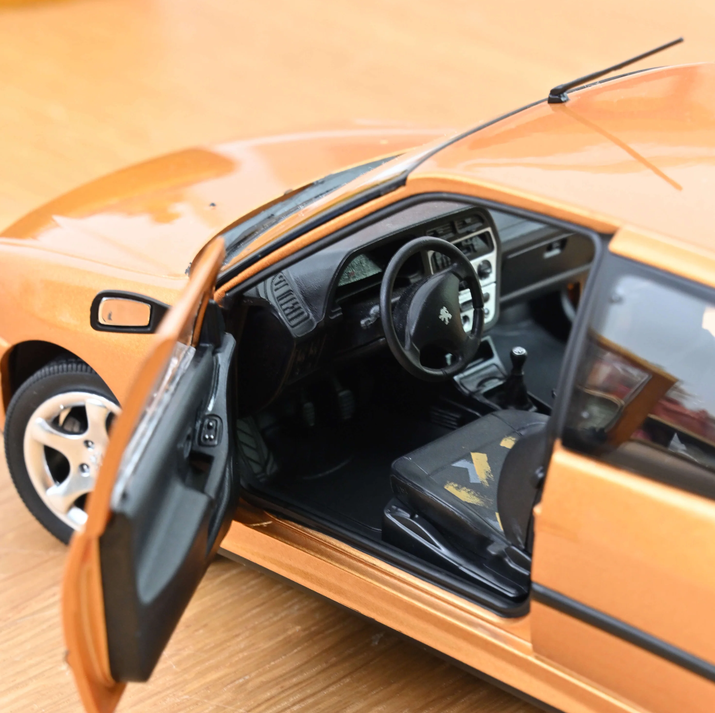 Norev 184940 Peugeot 306 S16 1997 Blaze Yellow 1:18 Standmodell