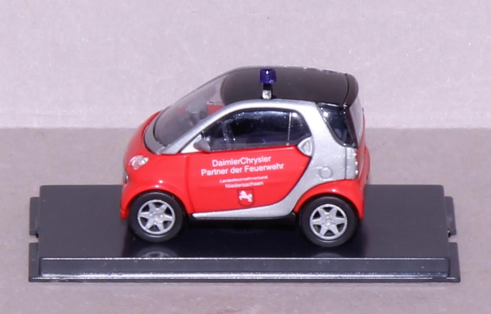 Busch 489309 Smart City Coupe Feuerwehr - 1:87 - Standmodell - Neu